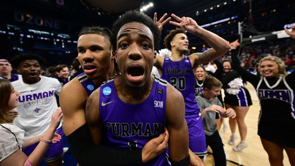 230317150354-02-march-madness-furman-shock-virginia