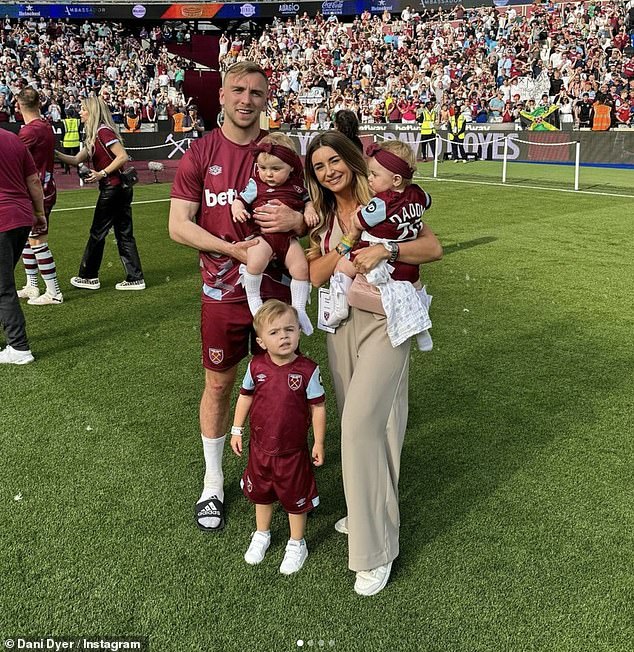 84751571-13408215-She_included_a_family_picture_on_the_pitch_with_Jarrod_also_27_t-a-113_1715471939433