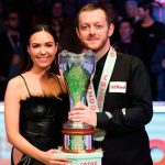 Mark Allen celebrates with wife-to-be Aideen Cassidy following his Cazoo UK Snooker Championship vic