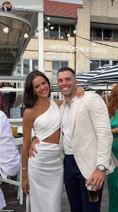 53268549-10432347-Sharp_Sydney_Roosters_captain_James_coordinated_with_his_ladylov-a-96_1642943278641